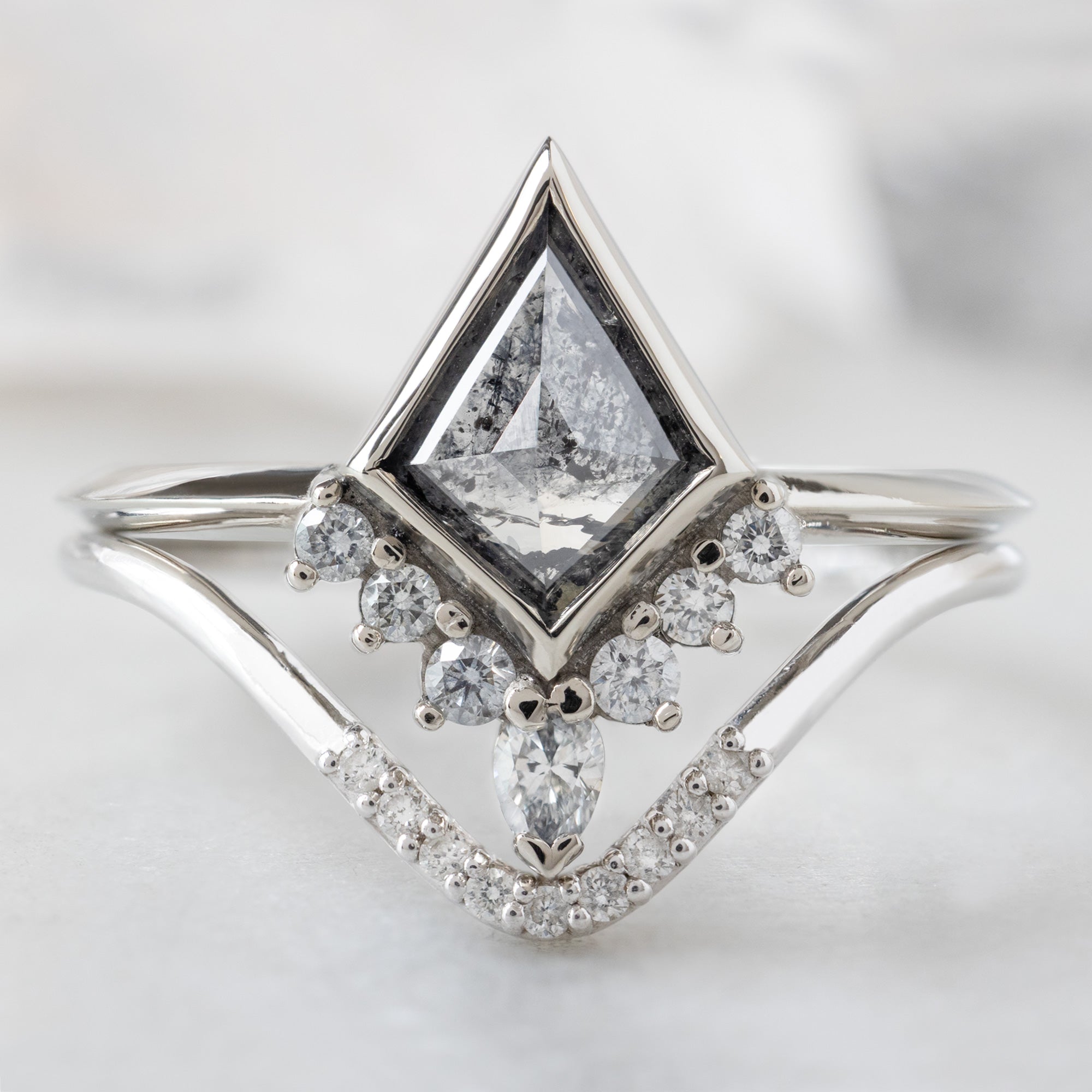 The Aster Ring with a 0.81ct Kite Salt and Pepper Diamond in 14K White Gold Stacked with the White Diamond Pavé Peak Stacking Band