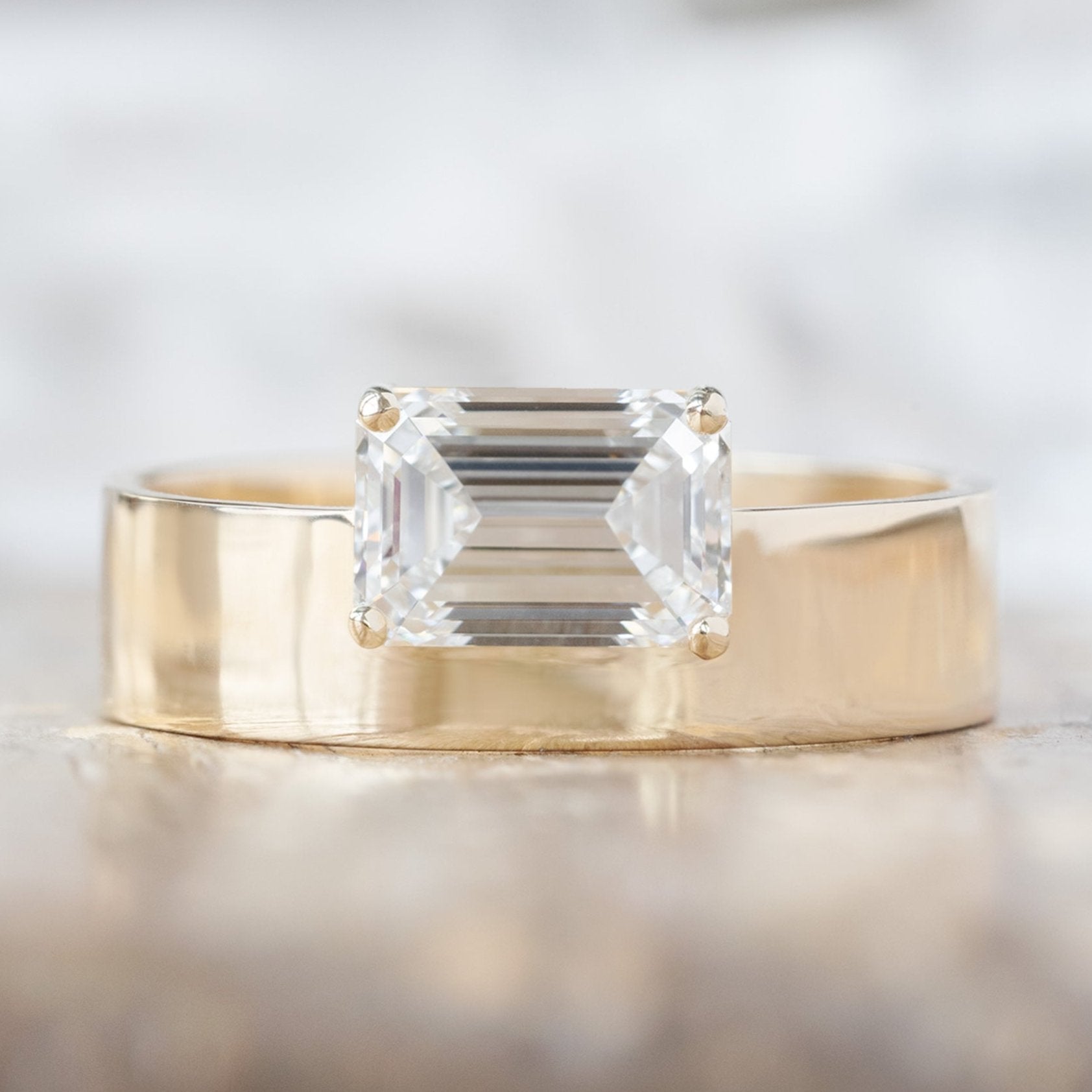 Alexis Russell Engagement Rings The Cigar Band | 0.90ct Lab Grown Emerald-Cut White Diamond in 14K Yellow Gold