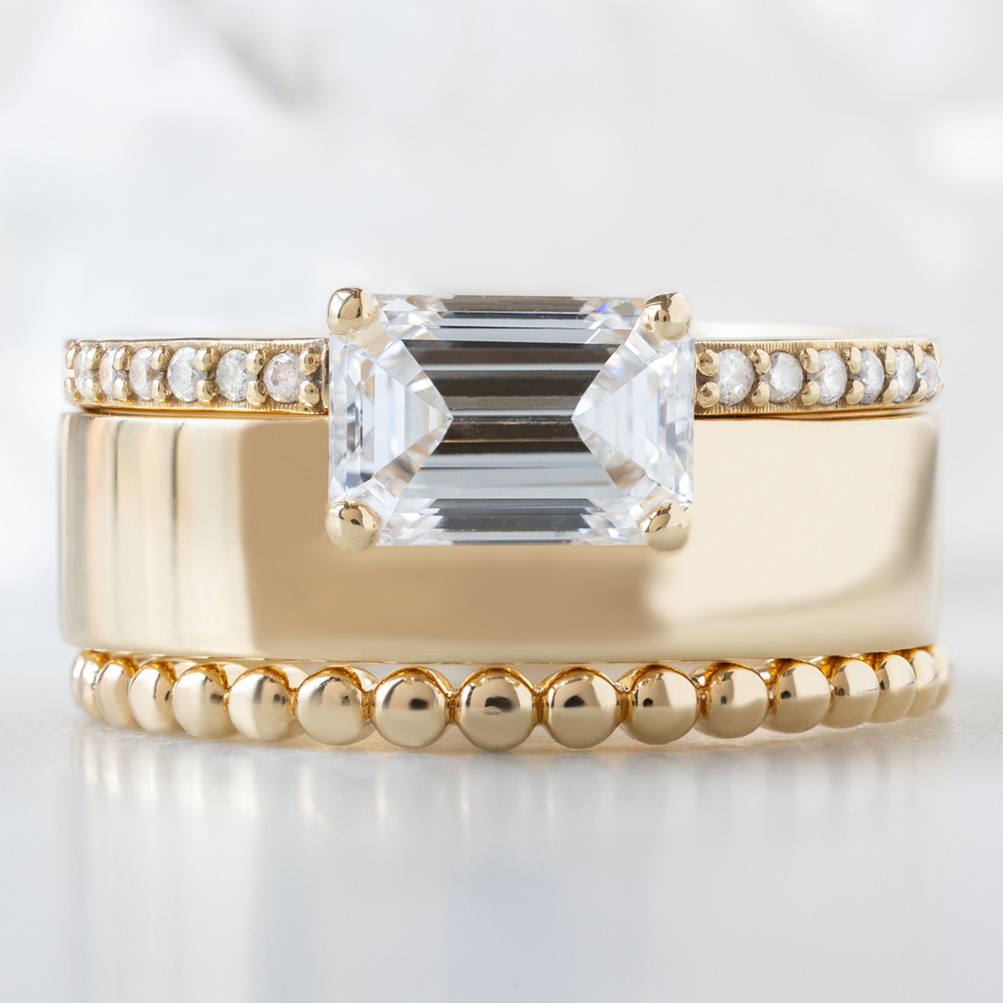 Alexis Russell Engagement Rings The Cigar Band | with a 0.90ct Lab Grown Emerald-Cut White Diamond in 14K Yellow Gold
