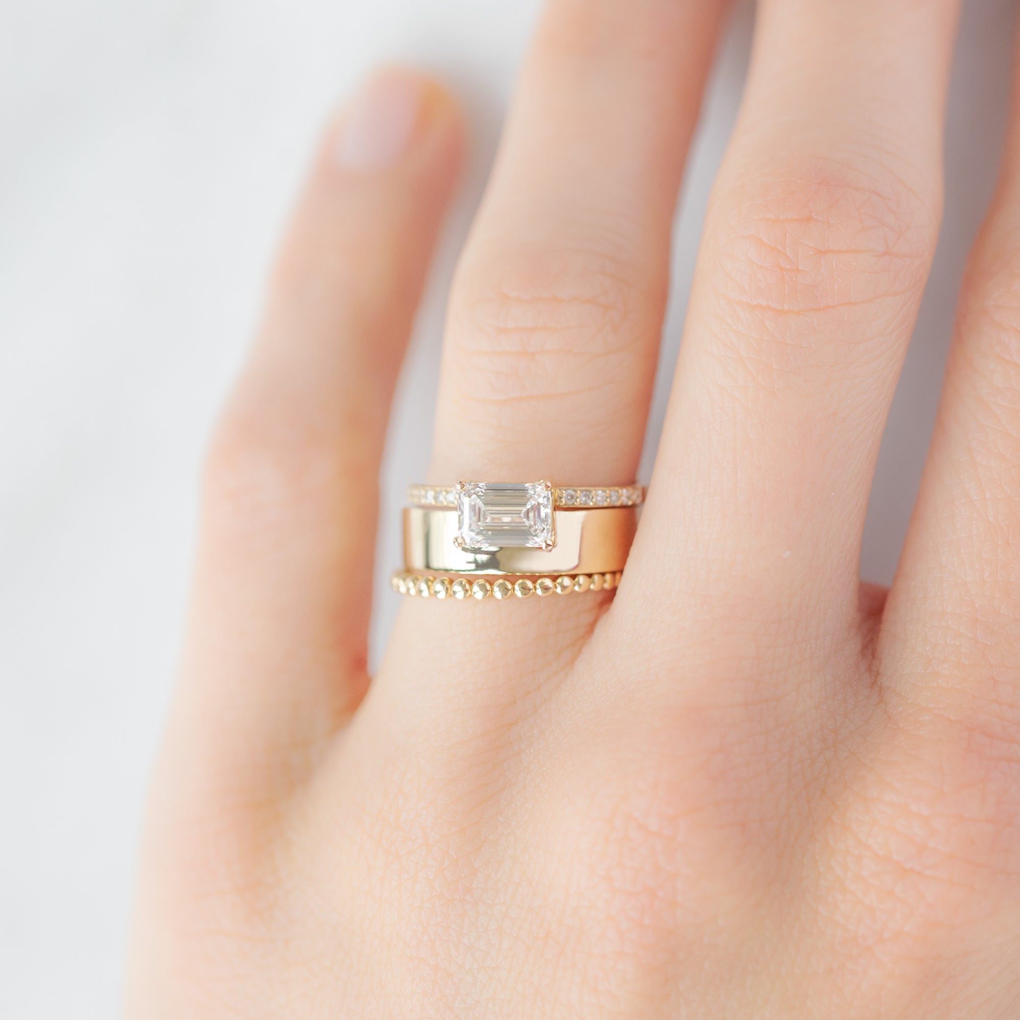 Alexis Russell Engagement Rings The Cigar Band | 0.90ct Lab Grown Emerald-Cut White Diamond in 14K Yellow Gold