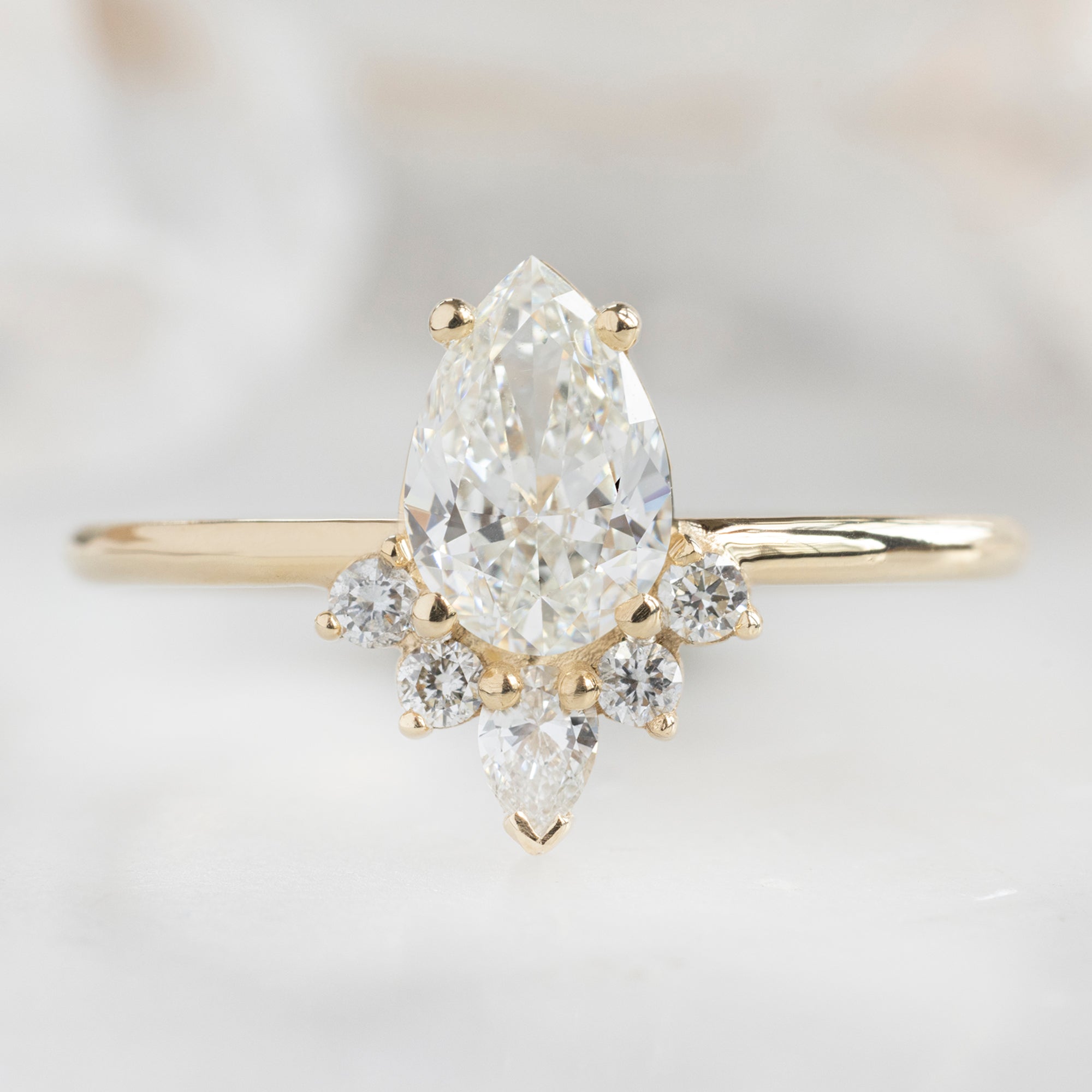 Alexis Russell Engagement Rings The Aster Ring | 0.71ct Pear Cut Natural White Diamond in 14K Yellow Gold