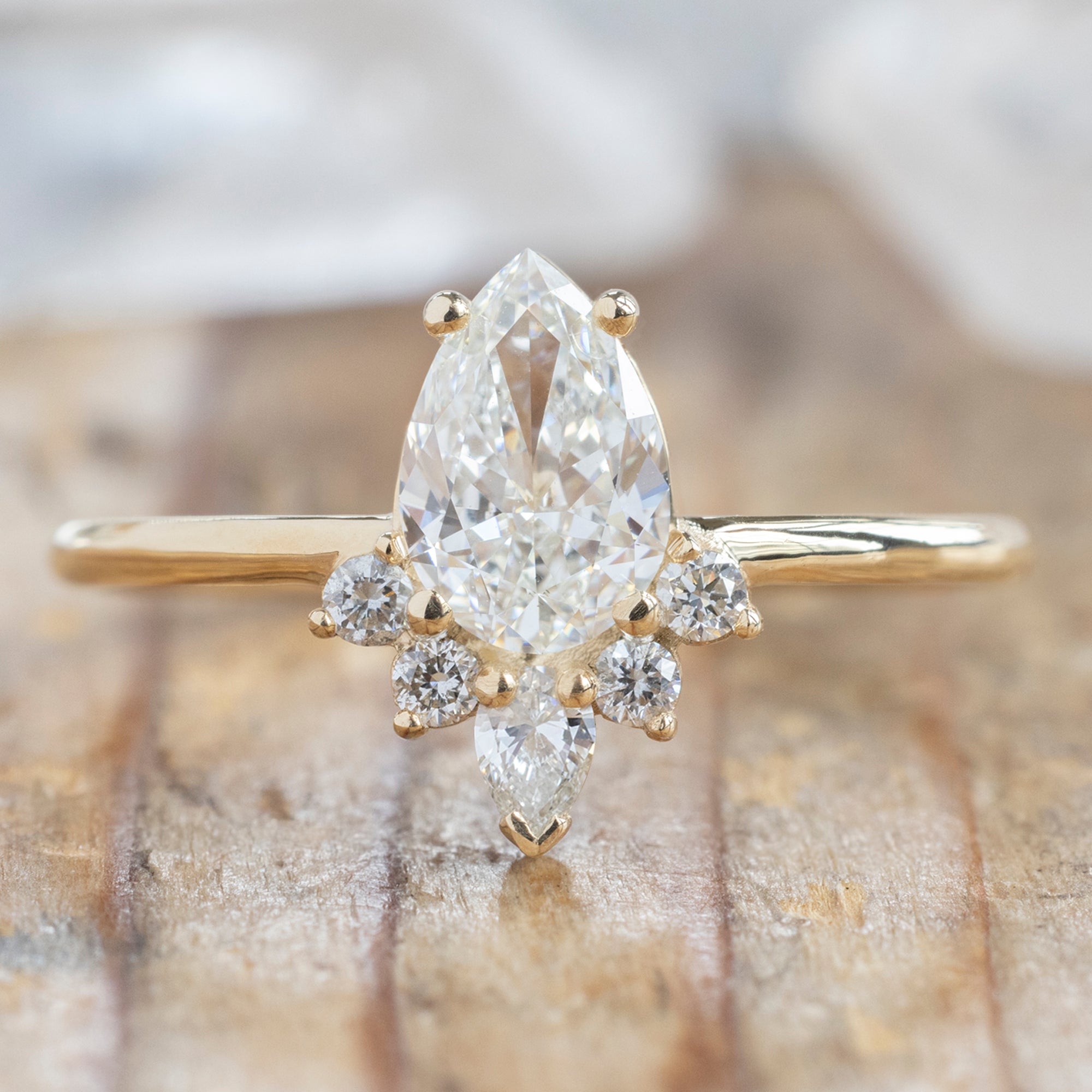 Alexis Russell Engagement Rings The Aster Ring | 0.73ct Pear Cut Natural White Diamond in 14K Yellow Gold