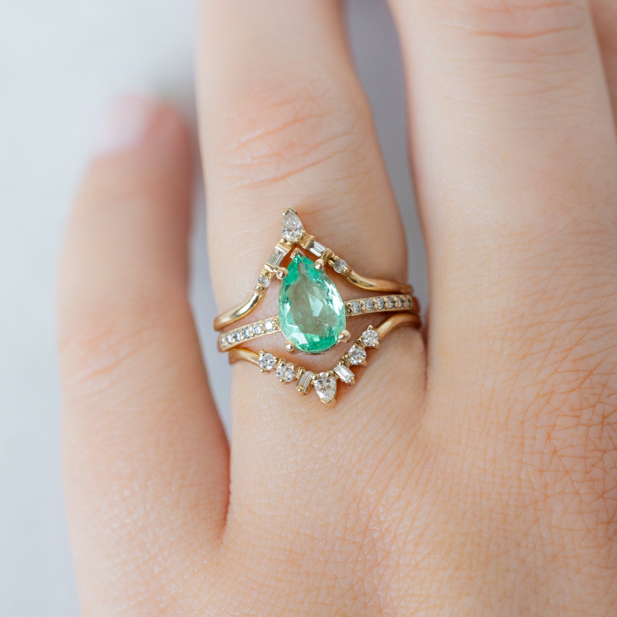 buy:white-diamond-tiara-stacking-band-14k-or-18k-yellow-gold,the-willow-ring-1-15ct-pear-emerald-in-14k-yellow-gold,geometric-white-diamond-sunburst-stacking-band-14k-or-18k-yellow-gold