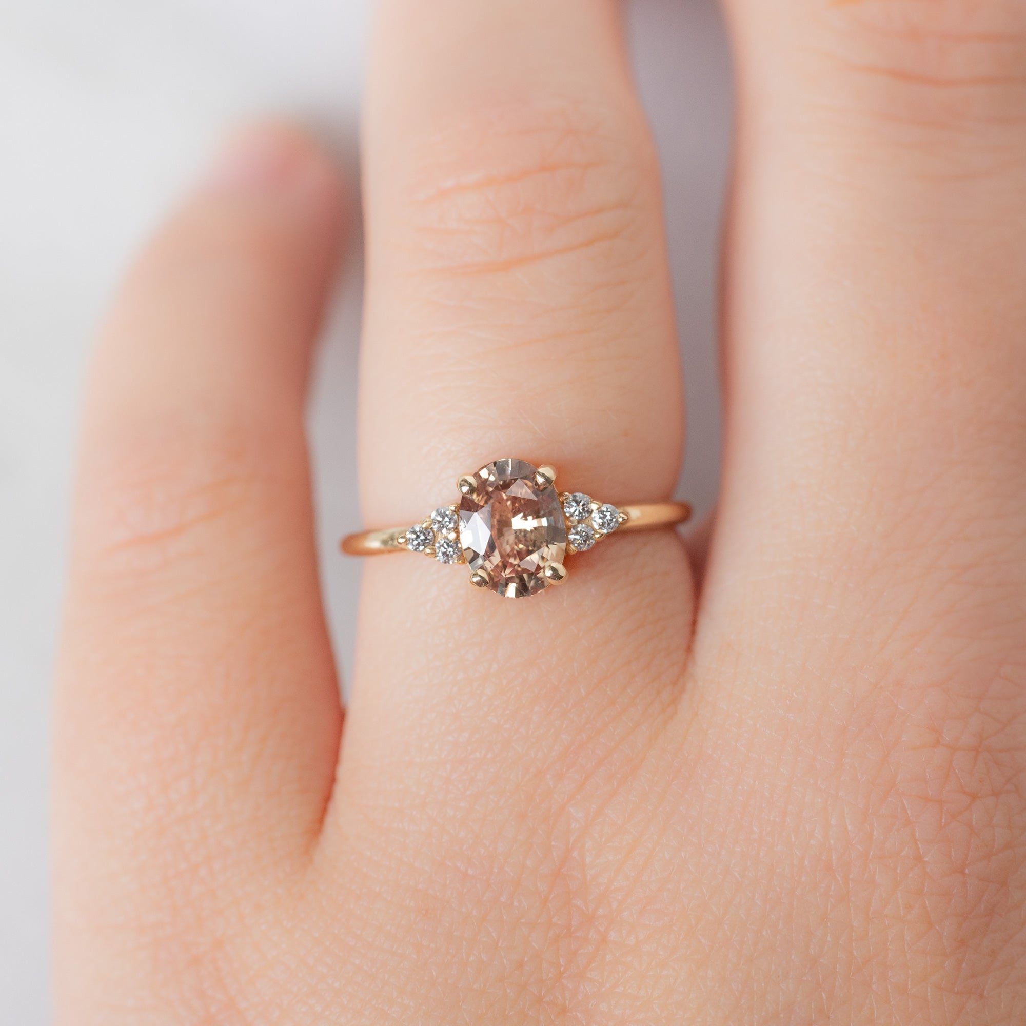 Alexis Russell  Engagement Rings The Ivy Ring | 1.13ct Oval Peach Sapphire in 14K Yellow Gold