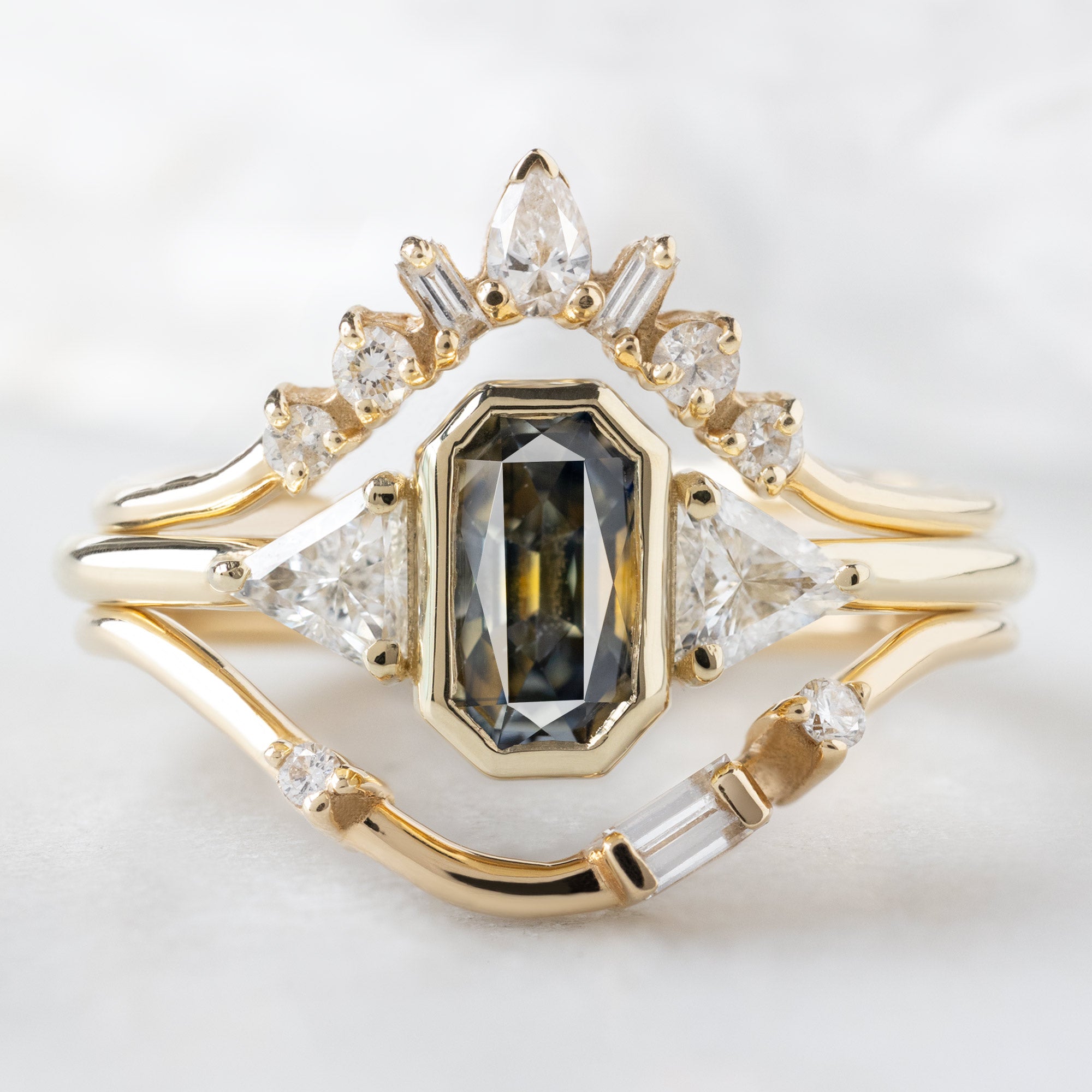 buy:geometric-white-diamond-sunburst-stacking-band-14k-or-18k-yellow-gold,the-watercolor-jade-ring-86ct-emerald-cut-parti-sapphire-in-14k-yellow-gold,asymmetrical-baguette-diamond-arc-stacking-band-in-14k-yellow-gold