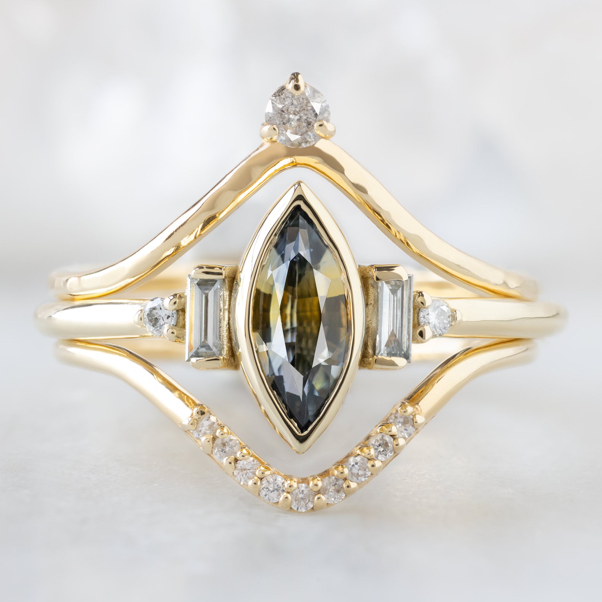 buy:salt-and-pepper-diamond-crown-stacking-band-14k-or-18k-yellow-gold,the-watercolor-primrose-ring-80ct-marquise-parti-sapphire-in-14k-yellow-gold,white-diamond-pave-peak-stacking-band-14k-or-18k-yellow-gold