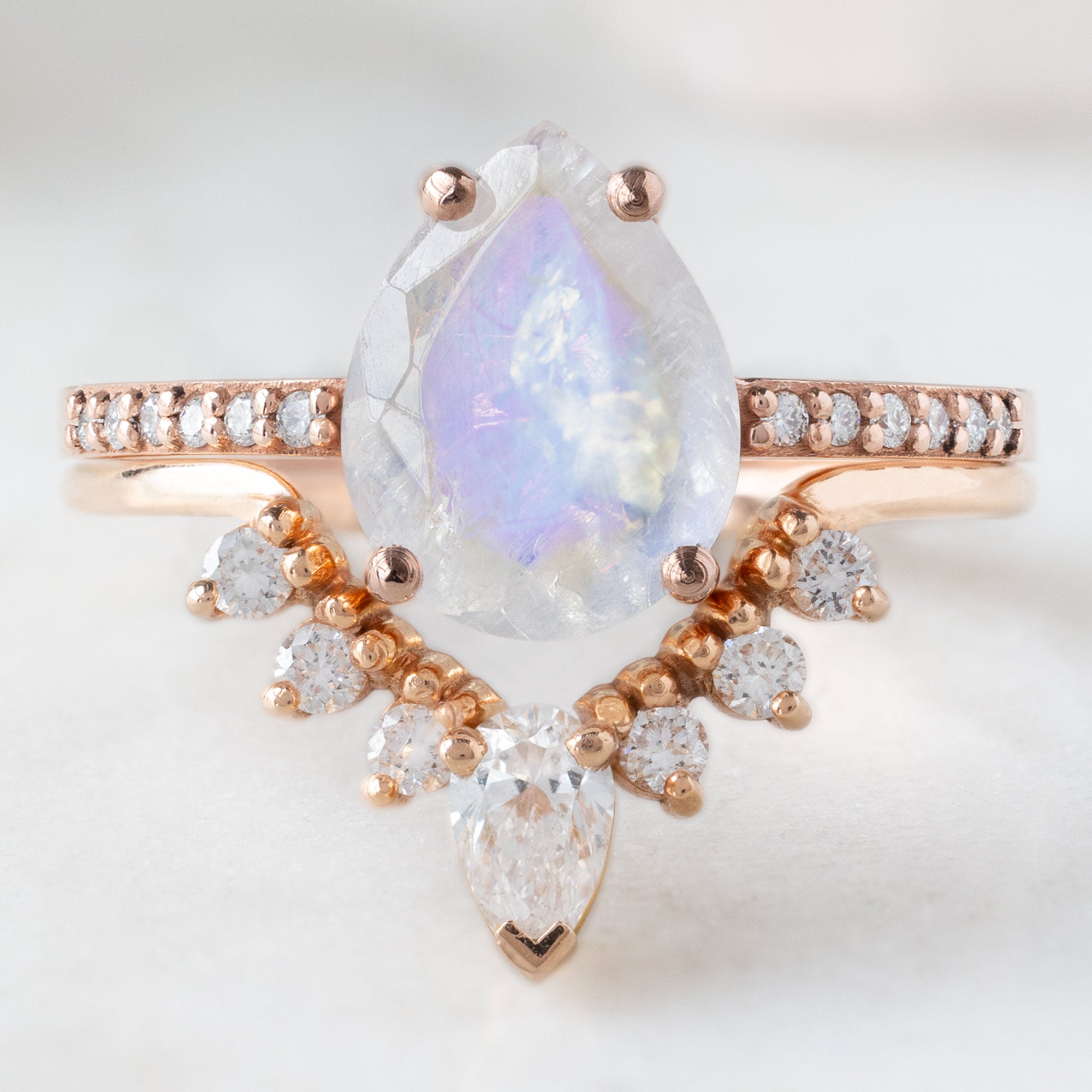 buy:the-willow-ring-1-38ct-pear-moonstone-in-14k-rose-gold,one-of-a-kind-pear-white-diamond-sunburst-stacking-band-14k-gold