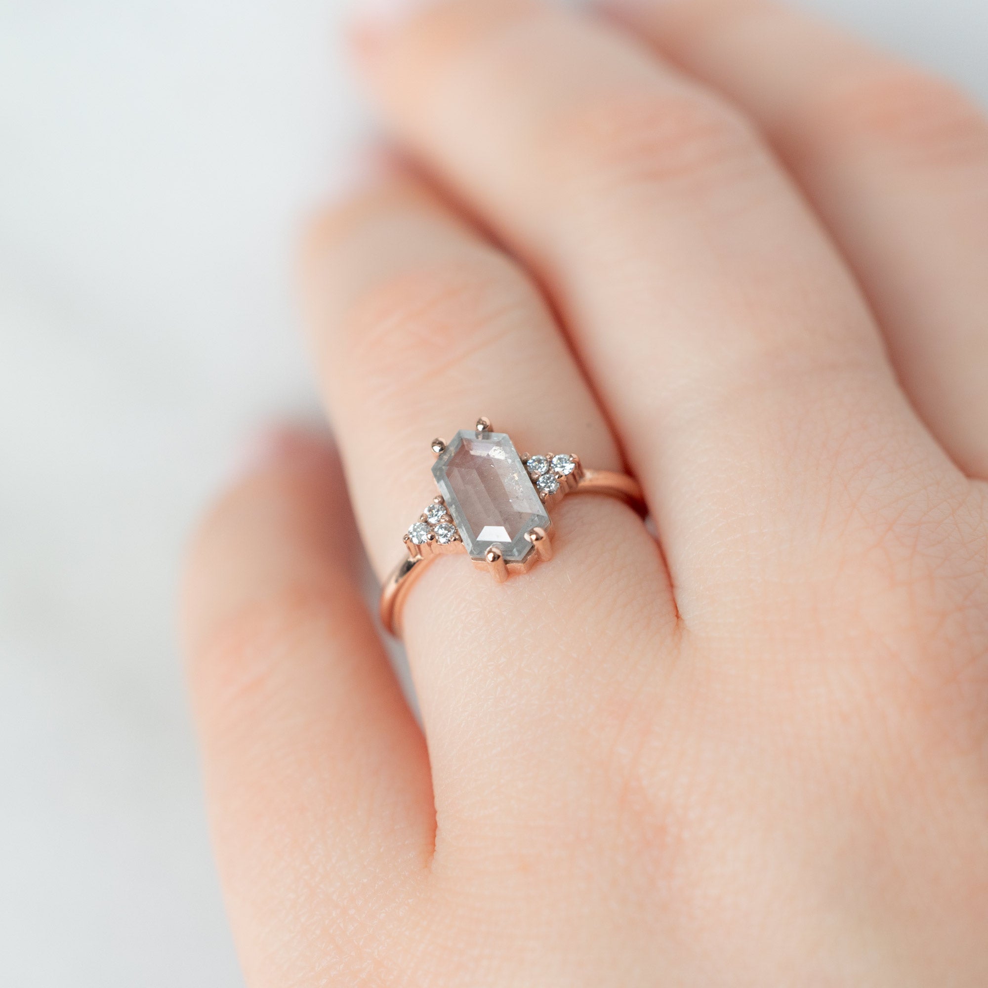 The Ivy Ring with a 1.55ct Hexagon Icy White Diamond in 14K Rose Gold on Model