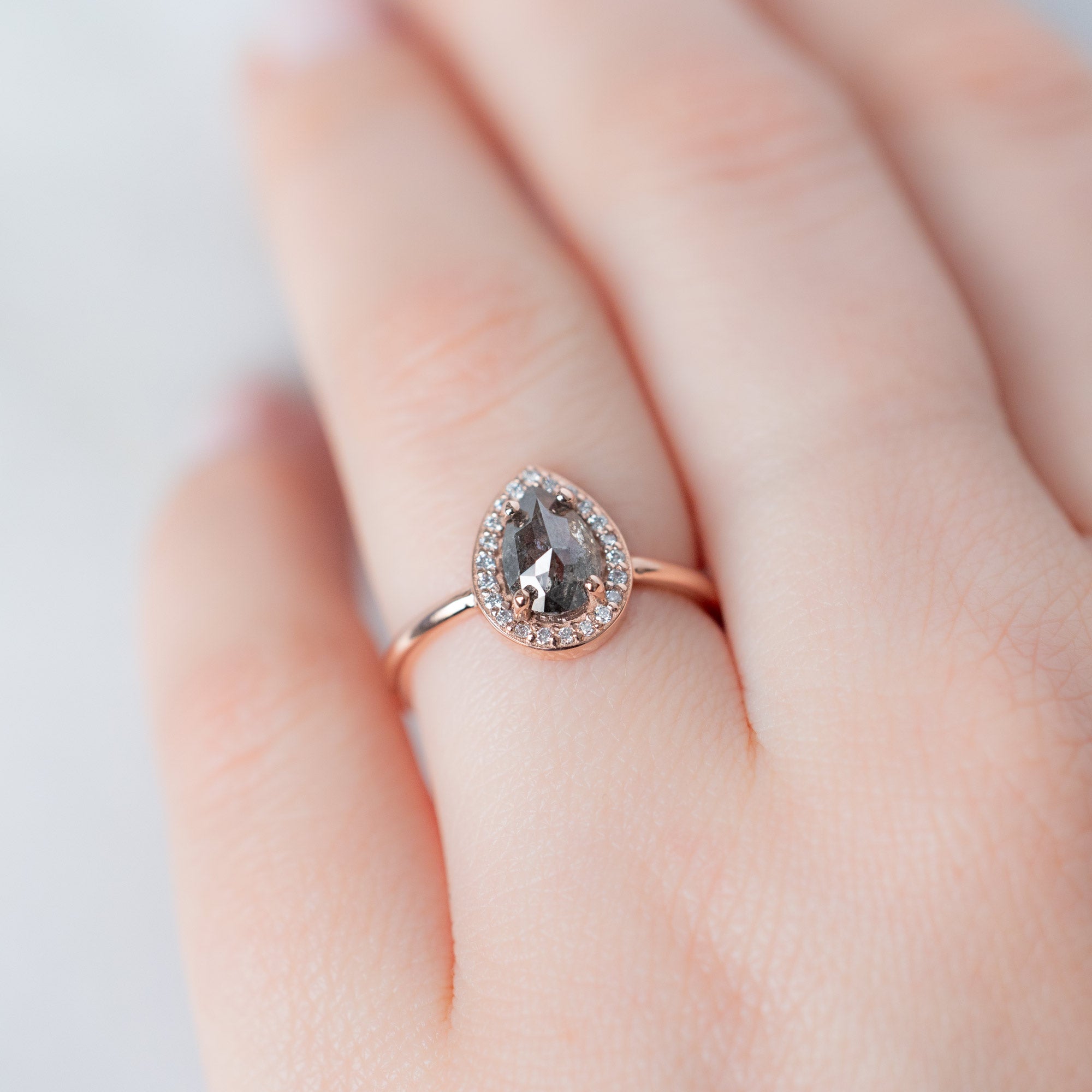 The Dahlia Ring with a 1.09ct Pear Salt and Pepper Diamond in 14K Rose Gold on Model