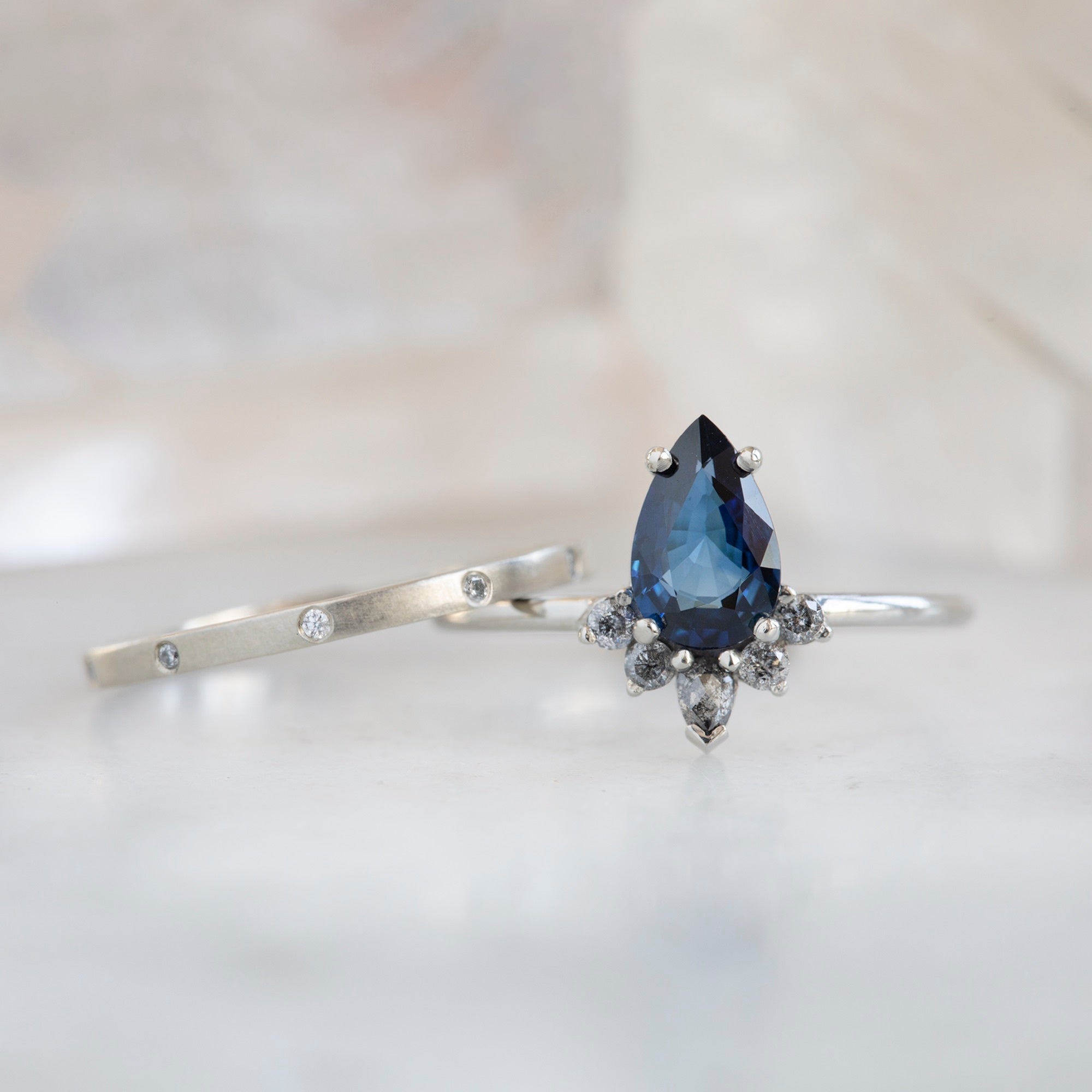 Alexis Russell Engagement Rings The Aster Ring | 0.90ct Pear Blue Sapphire in 14K White Gold