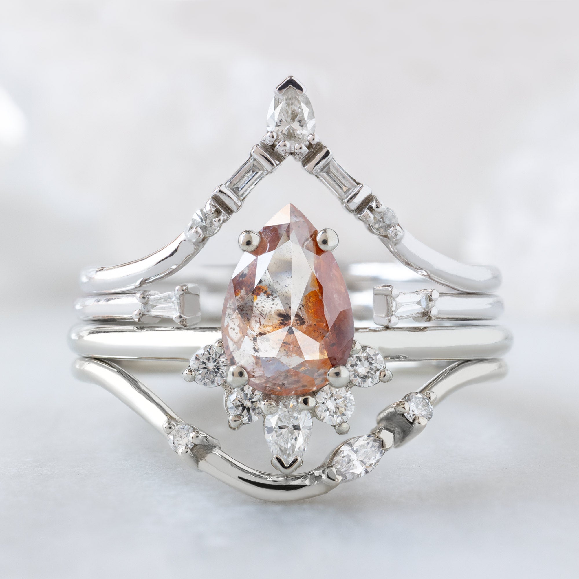 buy:white-diamond-tiara-stacking-band-14k-or-18k-yellow-gold,open-cuff-baguette-white-diamond-stacking-band-14k-or-18k-yellow-gold,the-aster-ring-1-03ct-pear-red-diamond-in-14k-white-gold,asymmetrical-marquise-diamond-arc-stacking-band-in-14k-yellow-gold