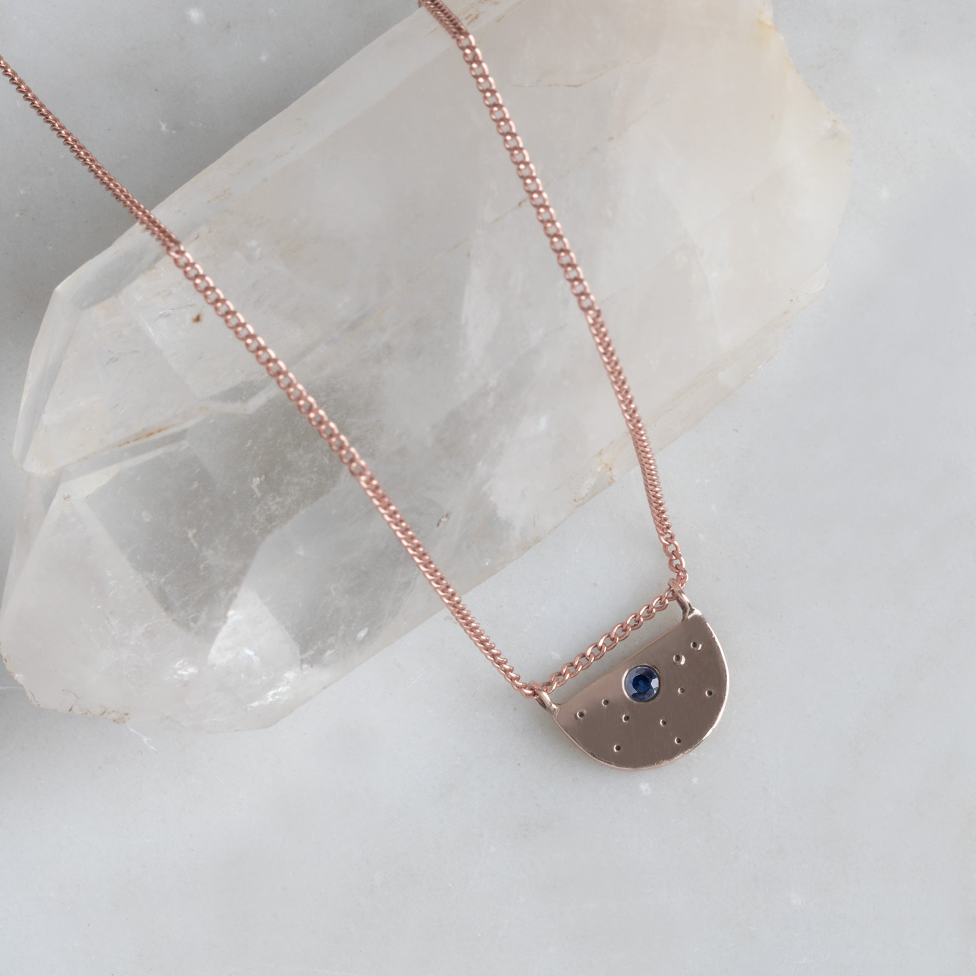Alexis Russell Necklaces The Blue Sapphire Half Moon Stardust Necklace | Rose Gold